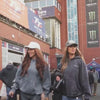 video showing two female models wearing vintage acid wash hoodies