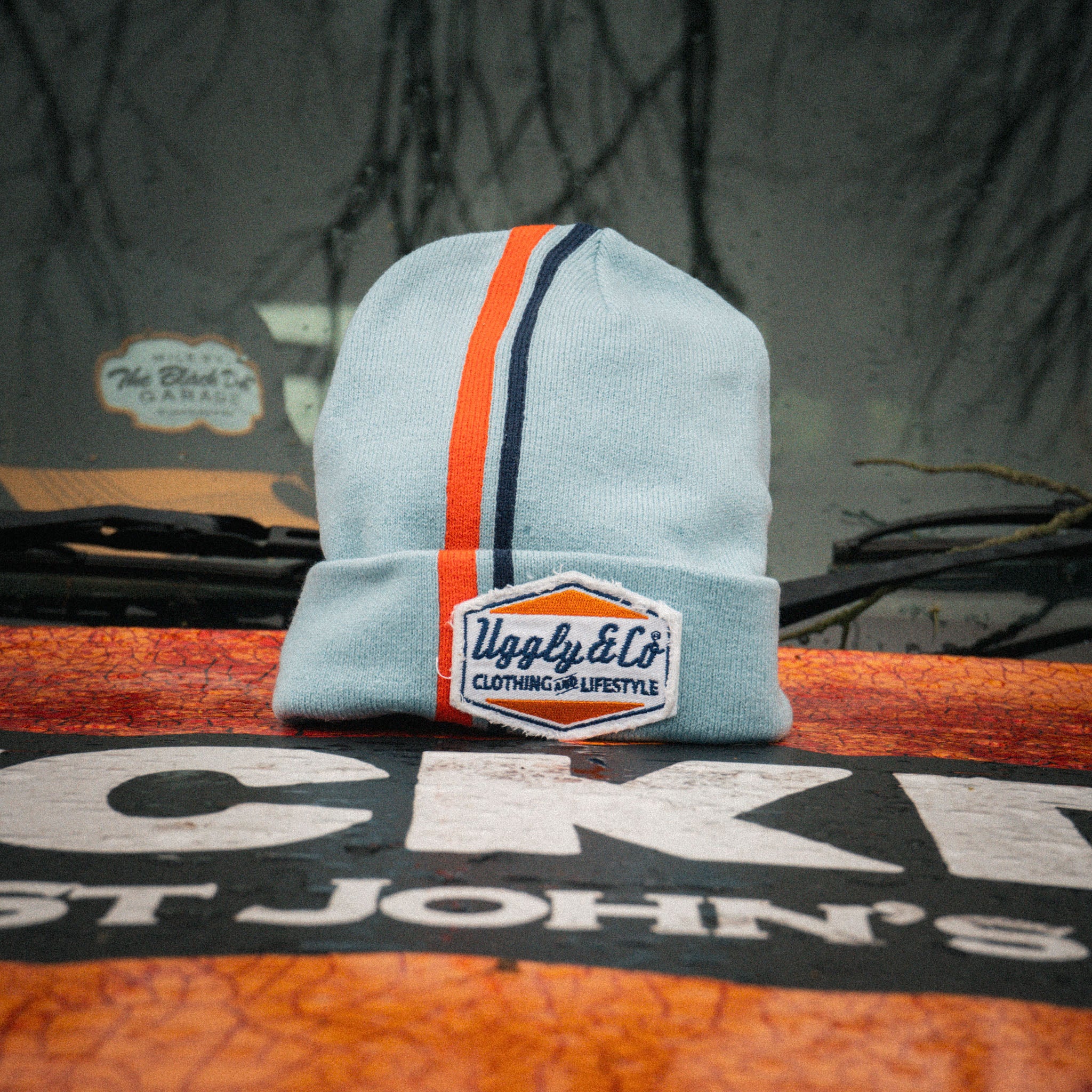 Retro Diamond Light Blue & Orange Marcus Simpson Signature Beanie with bold knit pattern