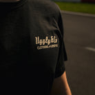 Close-up of the chest logo on the R&G Crash Protection x Diamond T-Shirt