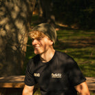 Rhys Irwin wearing the Olive Fisherman Beanie from the front