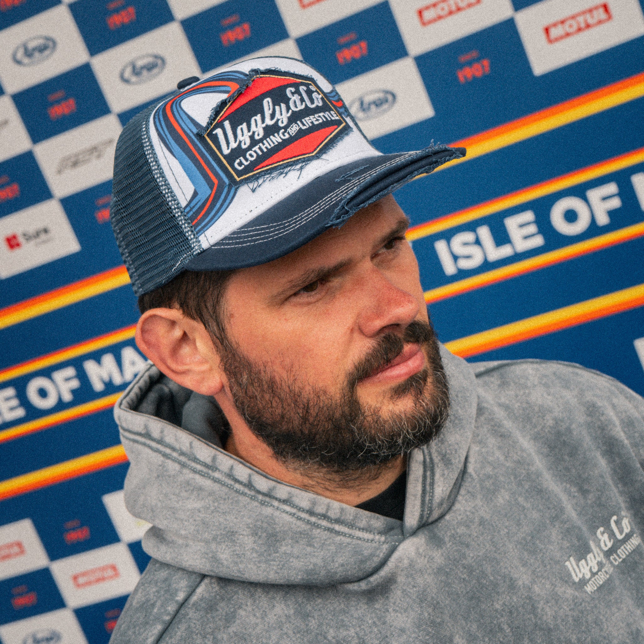 Shaun Anderson wearing the Retro Blue & Red Diamond Trucker Hat