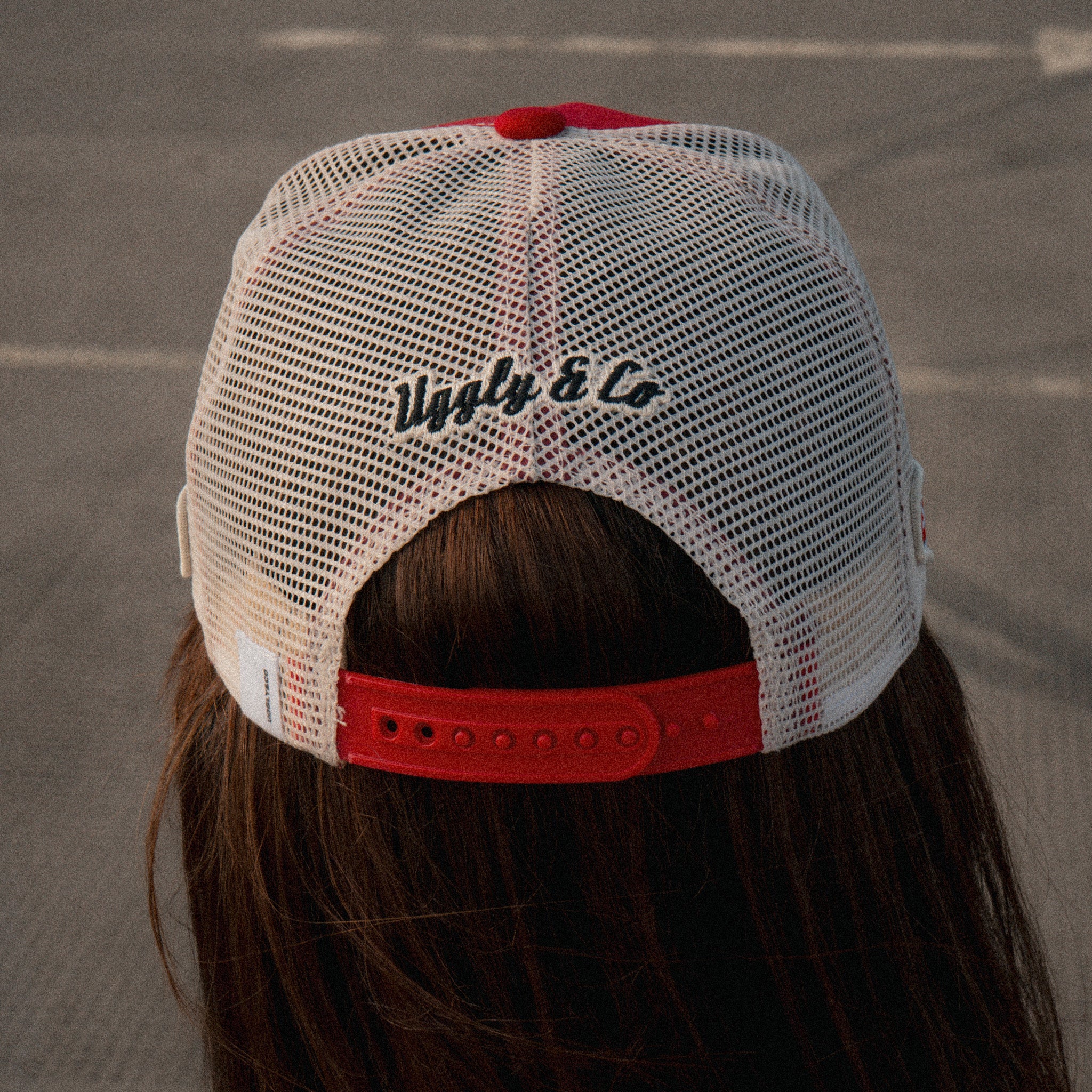 Back view of the Smokin’ Red Label Diamond Trucker Hat showing the mesh and adjustable closure