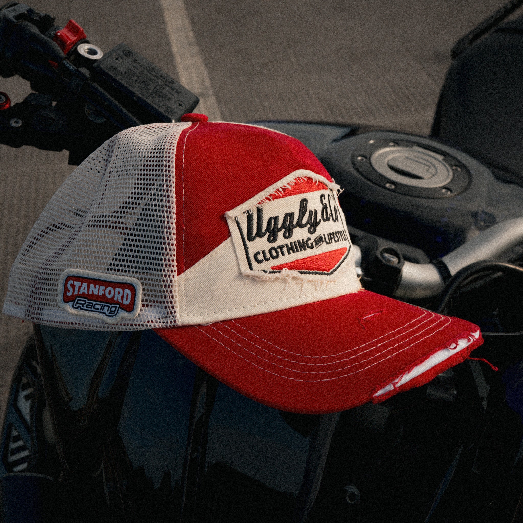 Side view of the Smokin’ Red Label Diamond Trucker Hat. Marlboro inspired 