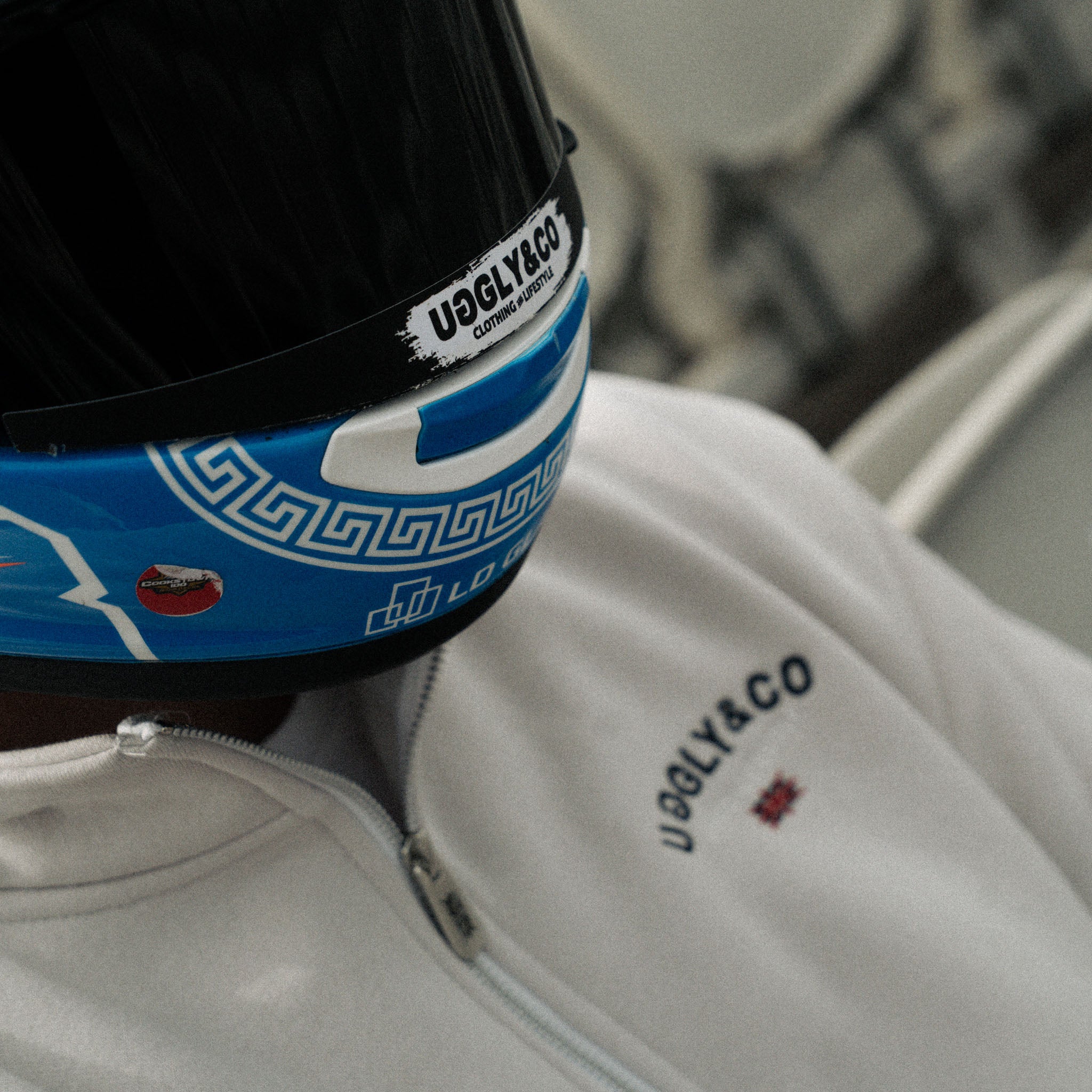 close up shot of Marcus Simpson wearing stone quarter zip