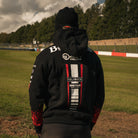 Back view of Storm Stacey wearing the Bathams Racing x AJN Steelstock Road Racing Hoodie trackside