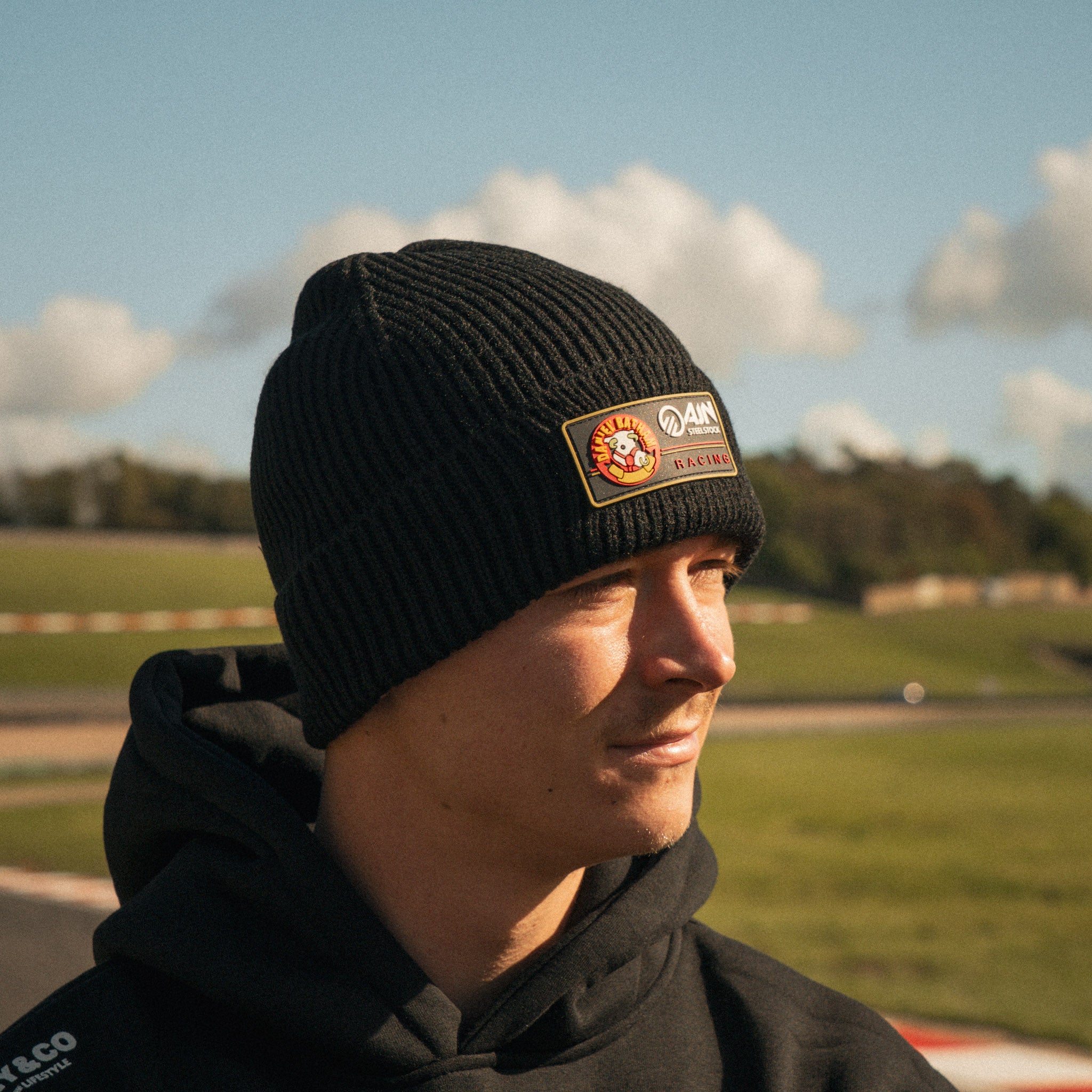 Storm Stacey wearing the Bathams Racing x Diamond Beanie from the front