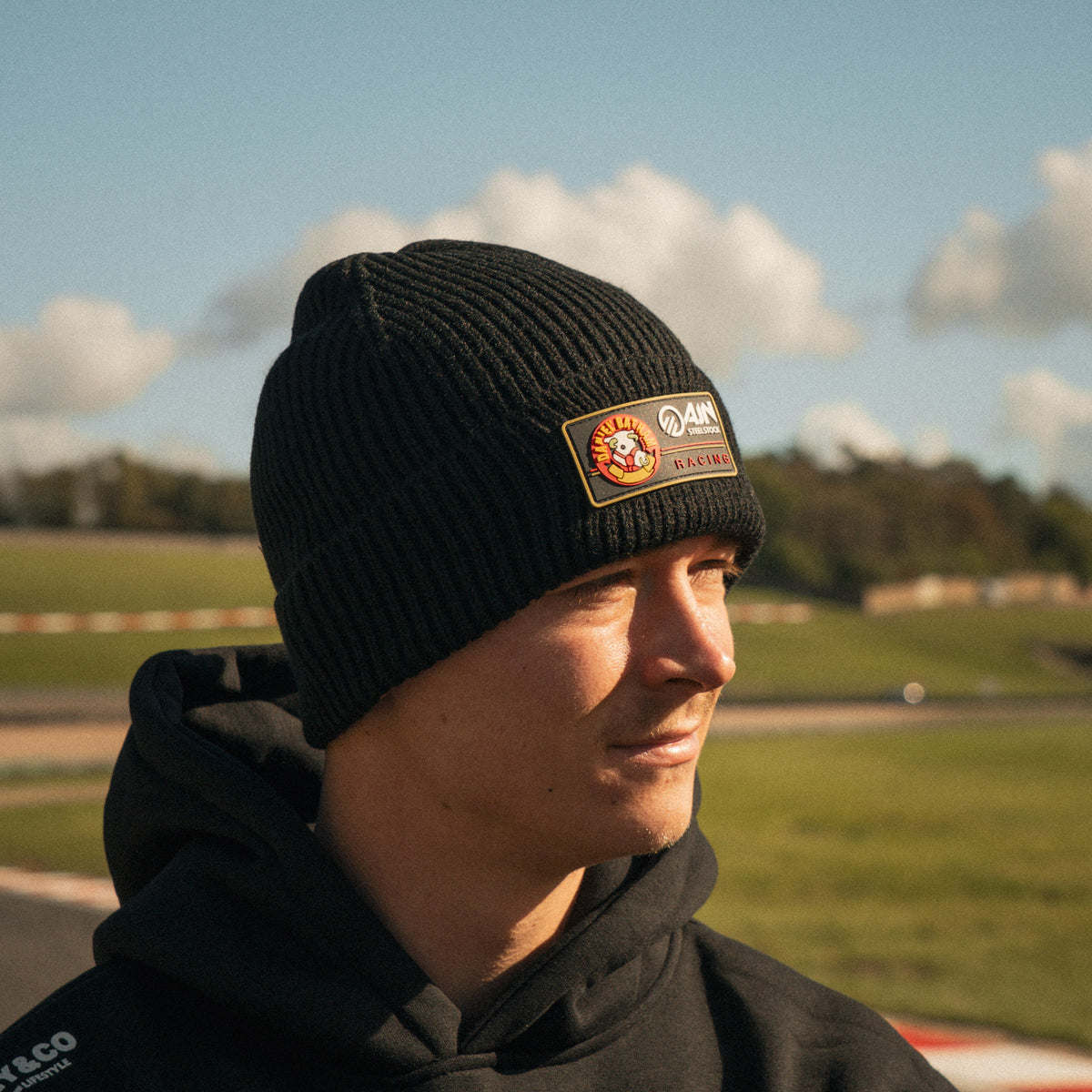 Storm Stacey wearing the Bathams Racing x Diamond Beanie from the front