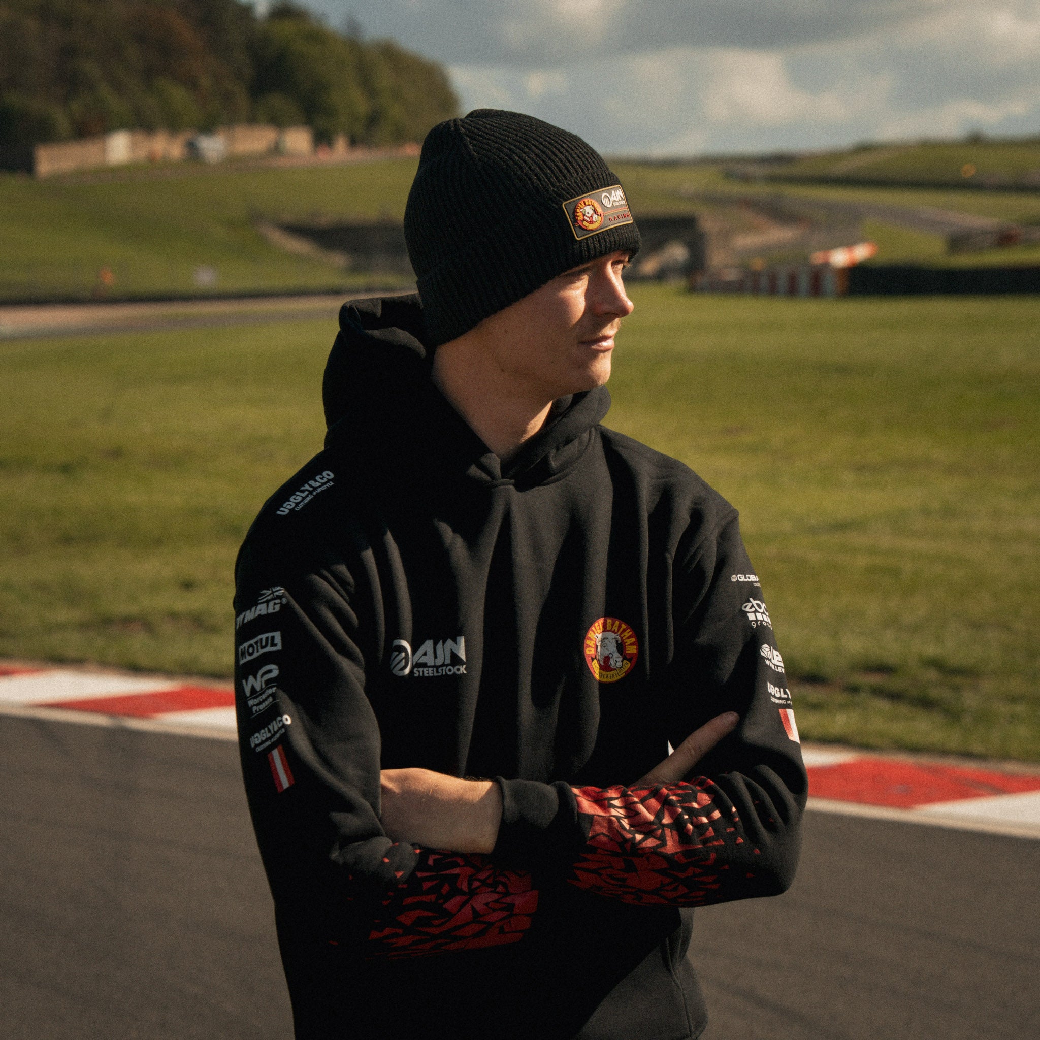Side view of Storm Stacey wearing the Bathams Racing x Diamond Beanie