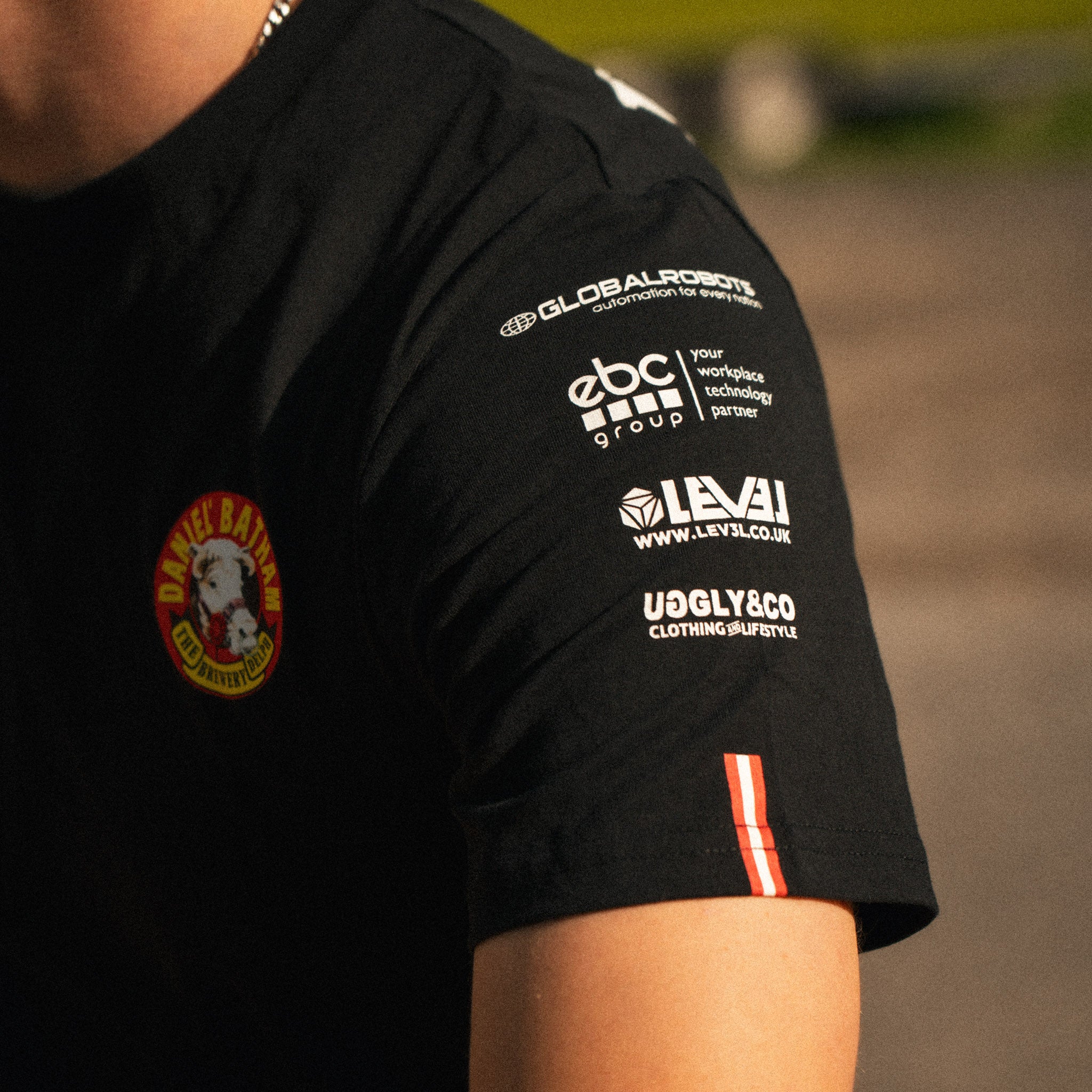 close up of the sleeve details on bathams racing t shirt