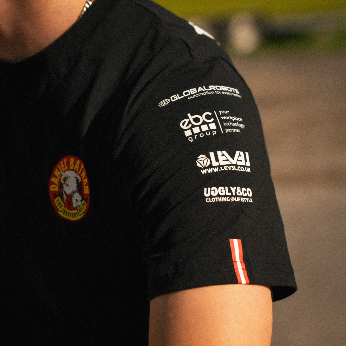 close up of the sleeve details on bathams racing t shirt