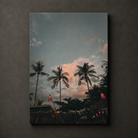 Palm trees silhouetted against a dusk sky with warm clouds and evening lights, shown as scenic canvas wall art. Thailand beach
