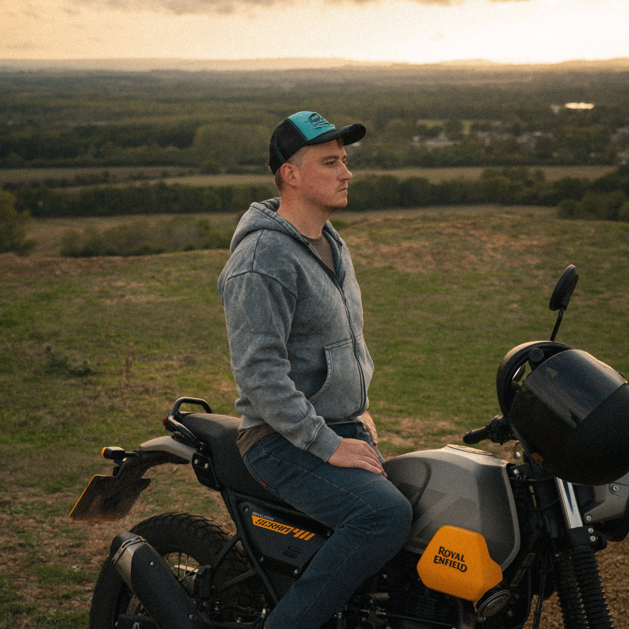 Uggly & Co Turquoise & Black Diamond Cap styled alongside a Scram 411 motorcycle