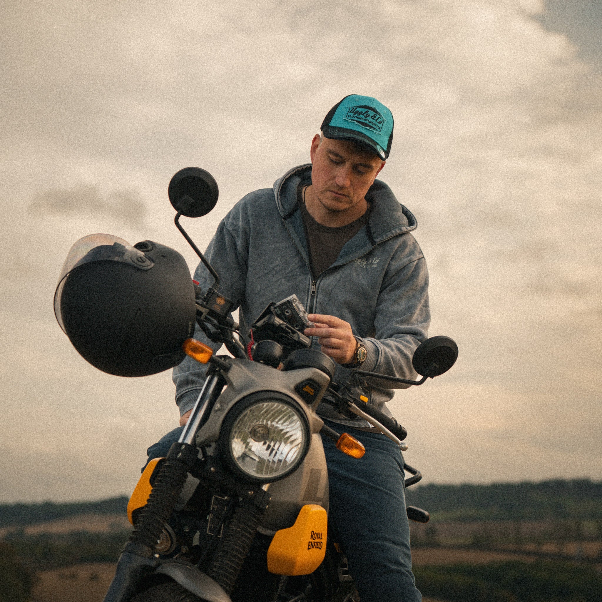 Turquoise & Black Diamond Cap photographed with a Royal Enfield Scram 411