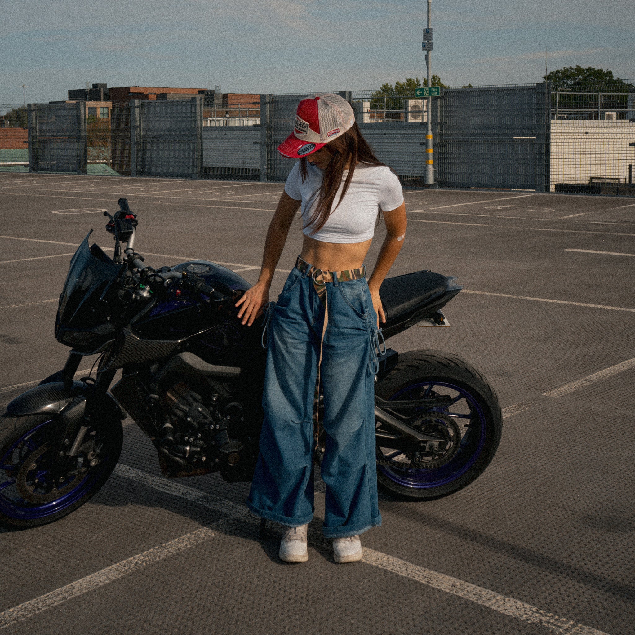 Female model wearing uggly and co Marlboro cap