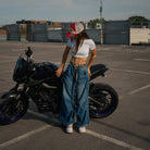 Female model wearing uggly and co Marlboro cap