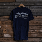 Black t-shirt with 'Moto Lifestyle' design on a wooden background