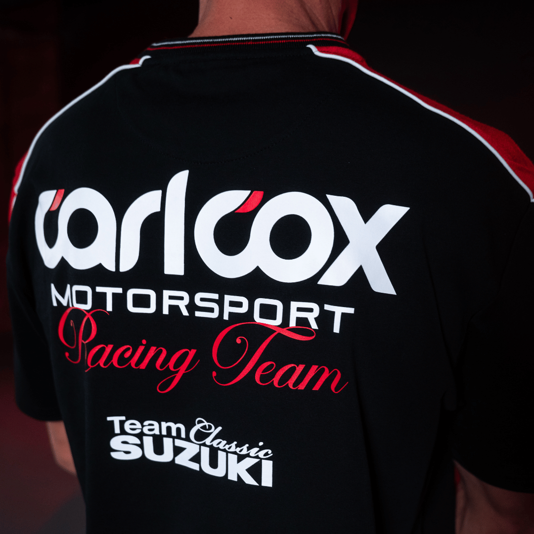Close up of the back logos on a Carl Cox motorsport and Team Classic Suzuki black and red t-shirt