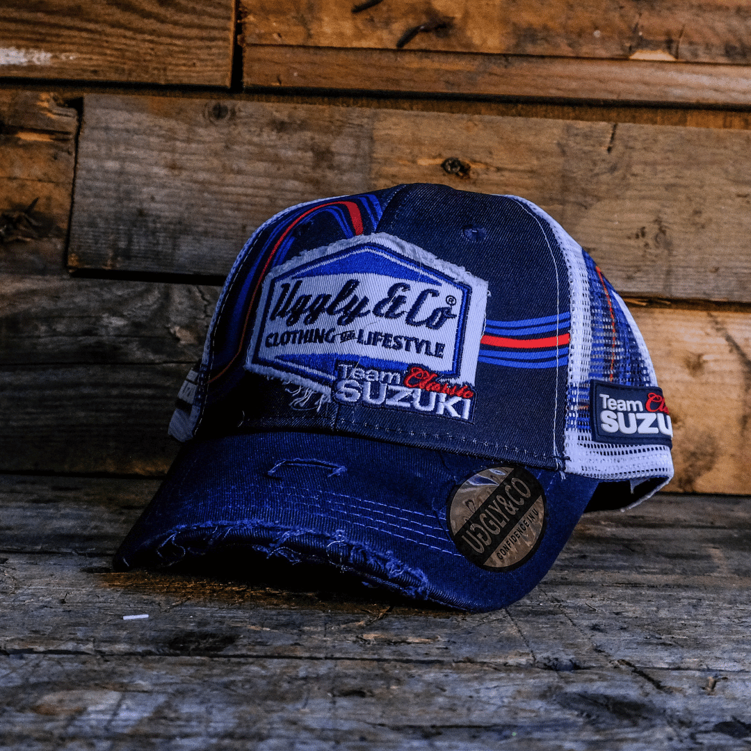 Team Classic Suzuki trucker hat on blue, red and white, with a mesh back and an Uggly&Co diamond logo on the front