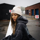 Female model wearing the Uggly&Co beige Diamond Beanie at the TT